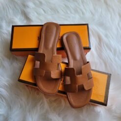 Hermès Oran Tan Slides with Double-Layered H Cutout