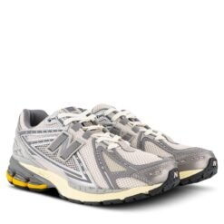 New Balance 1906U Beige Grey Sneakers with Yellow Sole Accent