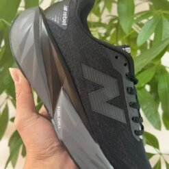 New Balance Rebel Triple Black Running Sneakers
