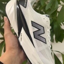 New Balance Rebel White Black Running Sneakers