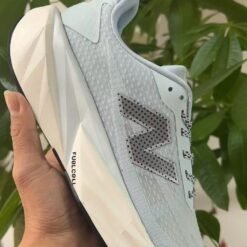 New Balance Rebel White Grey Running Sneakers