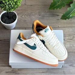 Nike - Air Force 1 Sneakers – White with Orange Swoosh