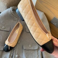 Quilted Leather Ballet Flats in Beige with Black Toe Cap – Chanel